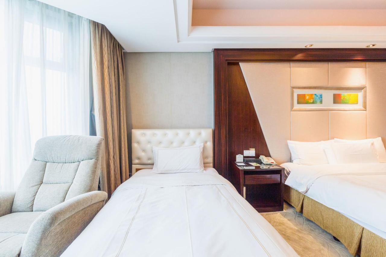 Shu Guang International Hotel Nanking Exterior foto